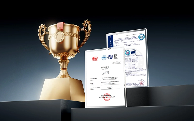 Gold trophy displayed alongside official testing reports and certificates of compliance.