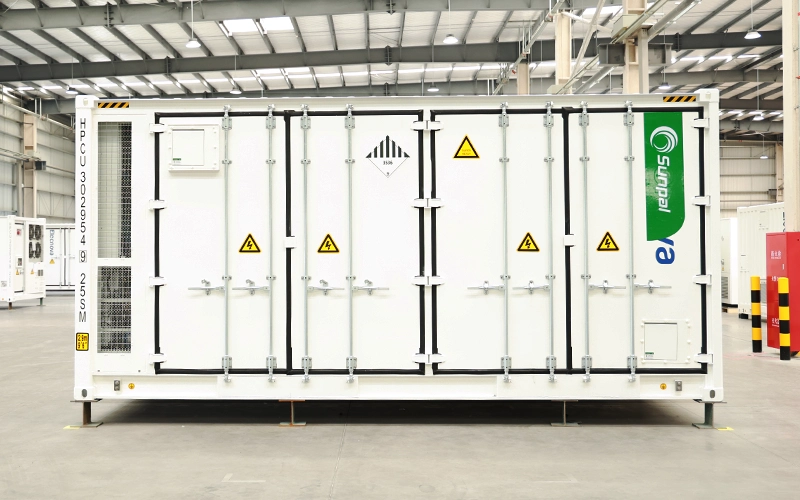 Front profile view of the Sunpal ECO-B20FT5015LP-2N 20-foot energy storage container with multi-door access inside a factory setting.