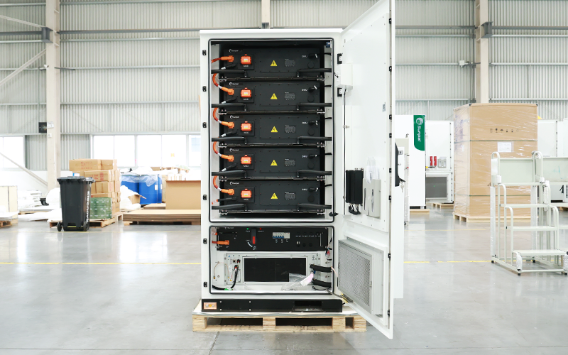 Open cabinet view of the ECO-B261LP-2H battery storage system showing stacked battery modules, high-voltage wiring, control unit, and internal cooling components.