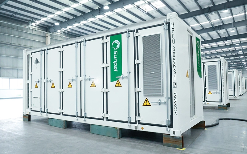 Sunpal 20ft containerized battery energy storage system (BESS) unit in an industrial factory setting.