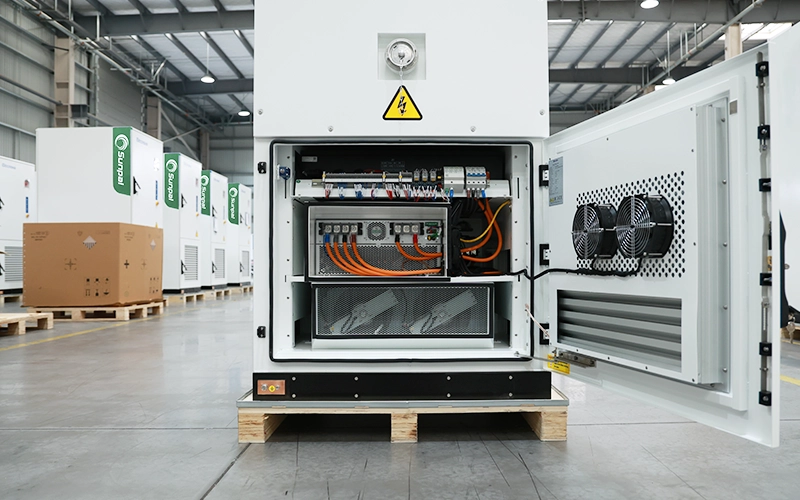 Rear open door view of the Sunpal ECO-E261LP-2A cabinet showing thermal management cooling fans, power terminal connections, and safety breakers.