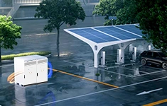 Outdoor solar EV charging station with a white energy storage cabinet powering charging piles under a solar canopy.